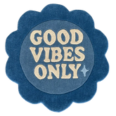 Blue circular rug flower shaped with 'Good Vibes Only'